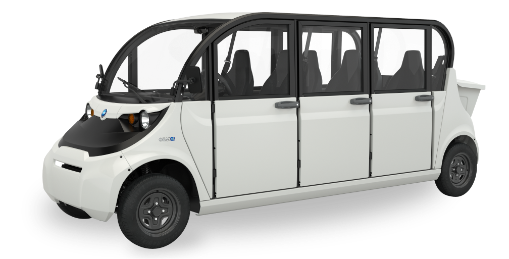 A six door white electric vehicle