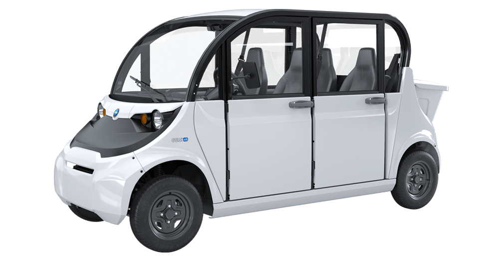 White 4 door electric vehicle