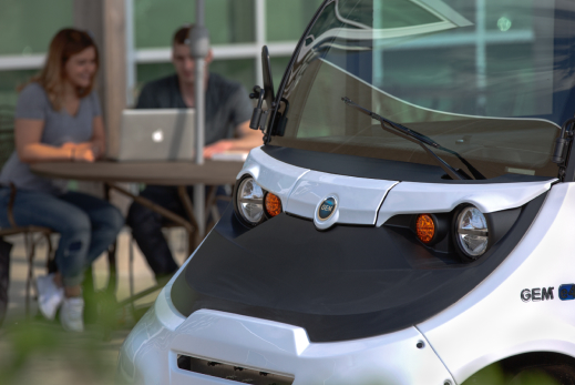 Close up of electric vehicle hood and headlights