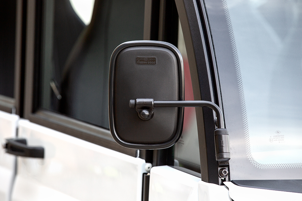 Close up detailing electric vehicle side view mirror