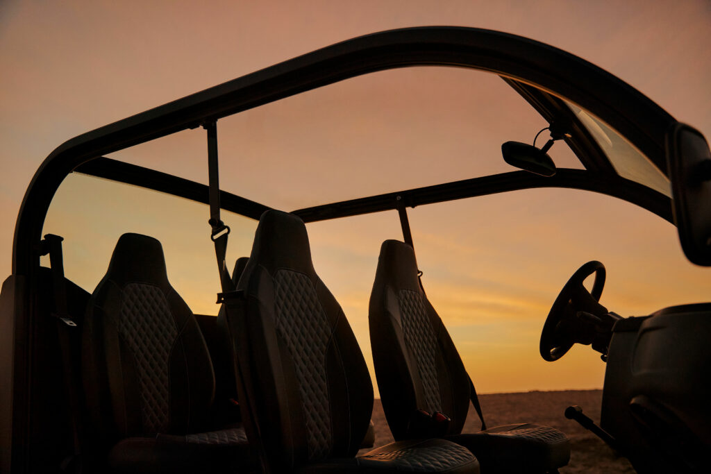 Inside an electric vehicle at sundown