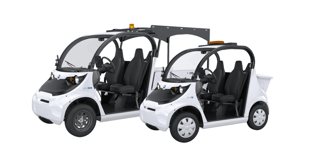 two white electric vehicles