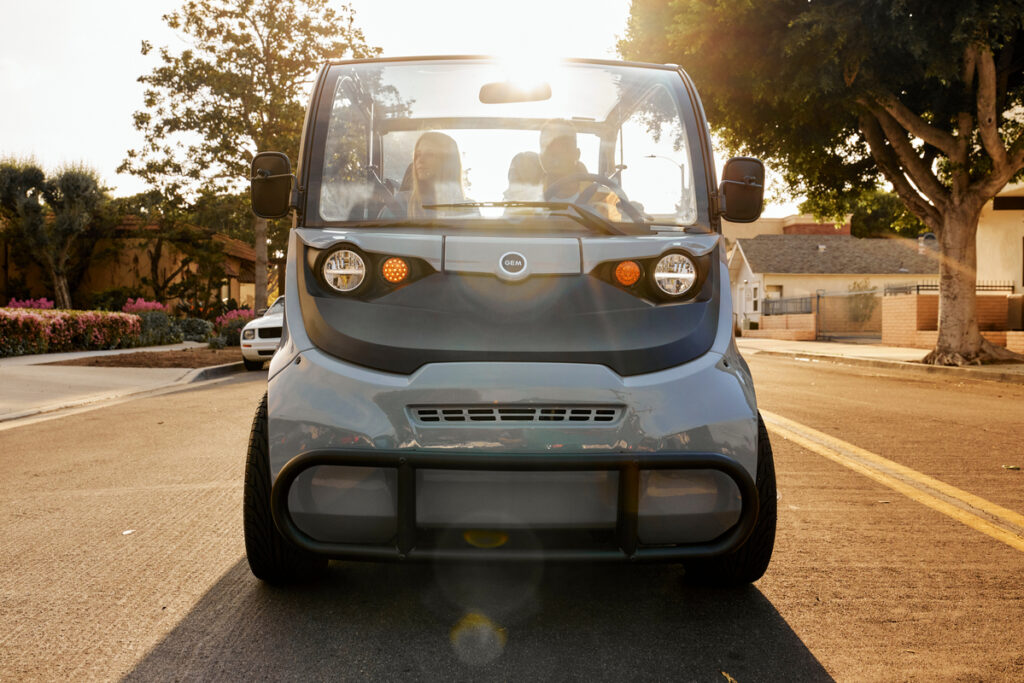 GEM low speed electric vehicles are the eco-friendly way to move and have more safety features than a golf cart with an enclosed cab